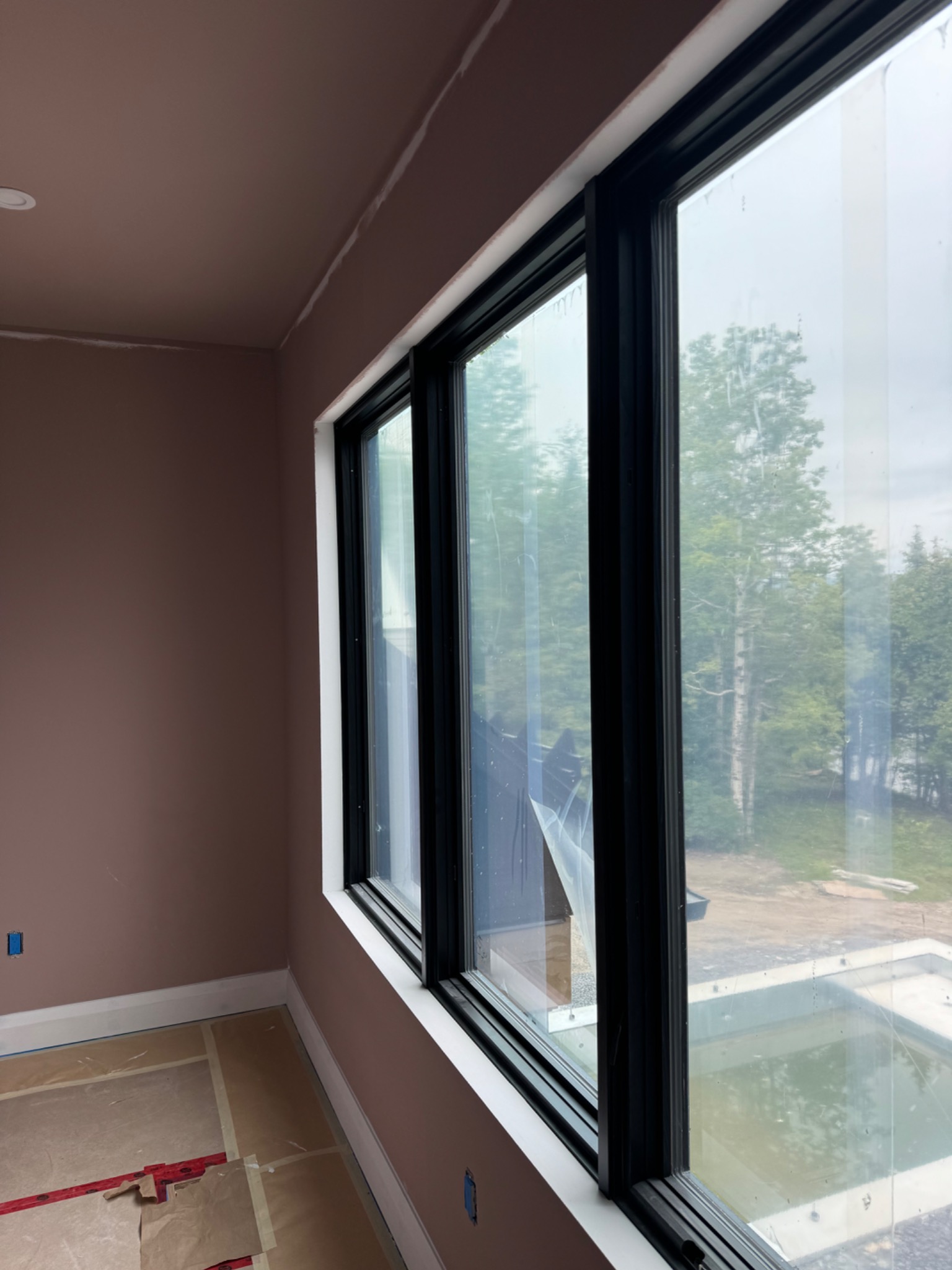 Finished custom-home window returns and painted walls
